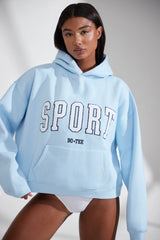 Varsity - Oversized Hooded Sweatshirt in Baby Blue
