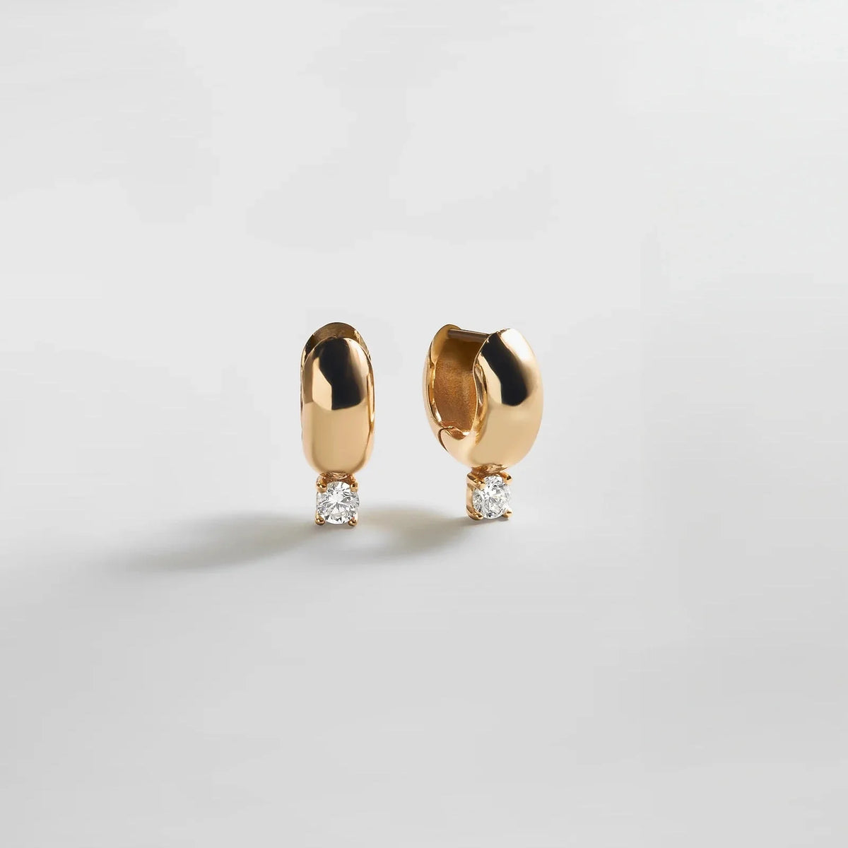 Kourtney Huggie Earrings - Kourtney Gold Plated Brass Earrings